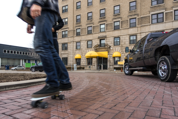 A student skates by CCS's Art Centre dormitory