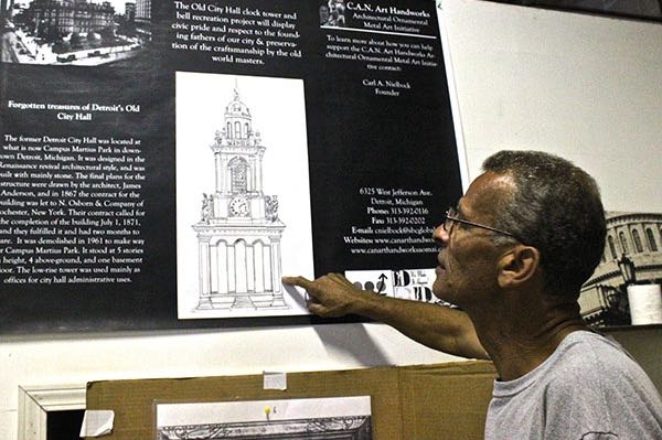 Nielbock explains some of his research into the clock tower restoration project