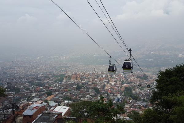 Metrocable, a link in Medellins dynamic public transit system, connects disparate neighborhoods and brings people together