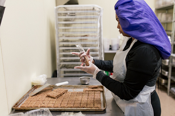 Takyhai Burns, Detroit Food Academy (DFA) Alumni and Small Batch Leader making Mitten Bites